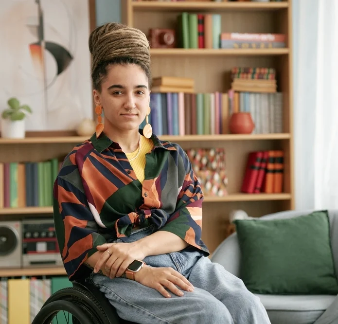 women on wheel chair in her home